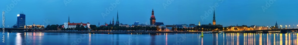 Naklejka premium Night panorama of Riga, capital of Latvia