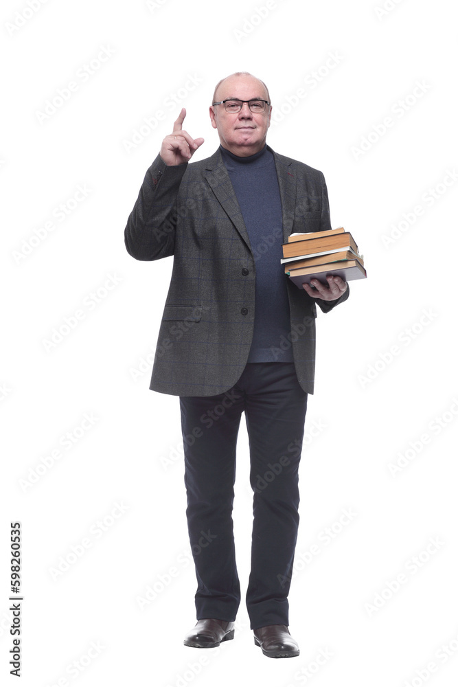 in full growth. senior business man with a stack of books in full growth. senior business man with a stack of books