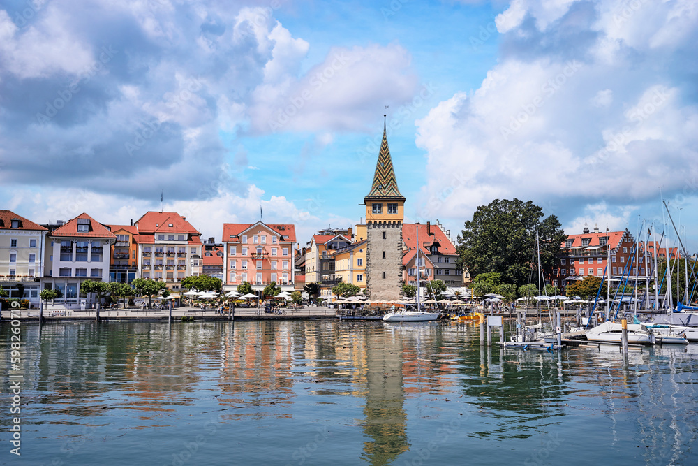 Travel by Germany. Promenade on the bay of Lindau's harbor.