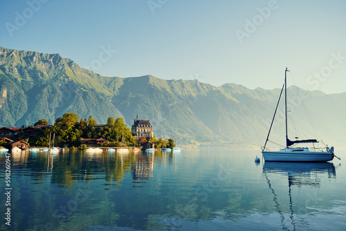 Beautiful swiss landscape. Iseltwald vilage on Brienzersee lake.