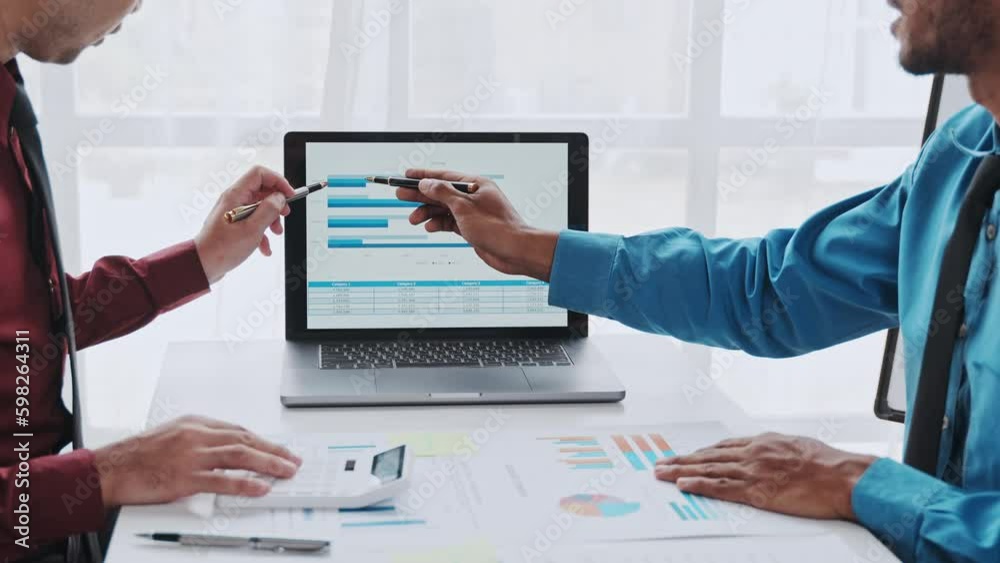 Young colleagues having great business conversations in a modern coworking office. Teamwork concept. Horizontal blurry background. Fireworks.. Young colleagues having great business conversations in a modern coworking office. Teamwork concept. Horizontal blurry background. Fireworks..