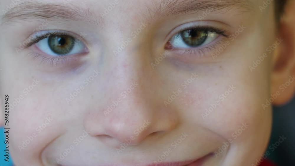 close-up portrait of a cheerful happy handsome caucasian boy 9 years old looking at the camera .the concept of childhood, school years., joyful days close-up portrait of a cheerful happy handsome caucasian boy 9 years old looking at the camera .the concept of childhood, school years., joyful days