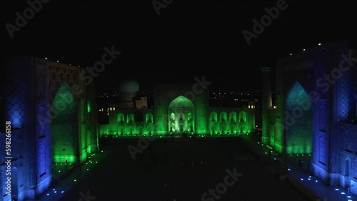 Samarkand, Uzbekistan aerial view of Ulug bek madrassah,  Colorfull Registan square at night