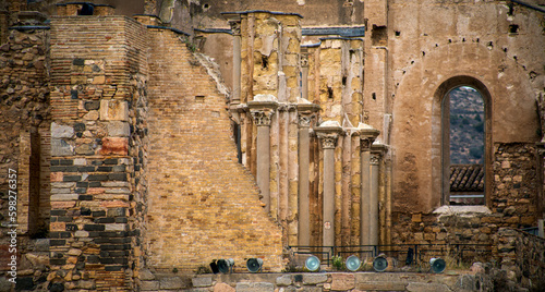 View of the remains of the old cathedral of Cartagena, Murcia, Spain, with the columns of the central nave and a window in the background © AntonioLopez