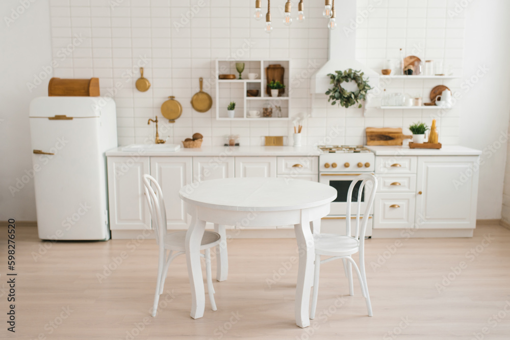 Cozy modern Scandinavian style kitchen with dining area, white modern interior Cozy modern Scandinavian style kitchen with dining area, white modern interior