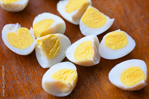boiled eggs food, quail eggs on wooden, breakfast eggs with fresh quail eggs and vegetable lettuce on table background