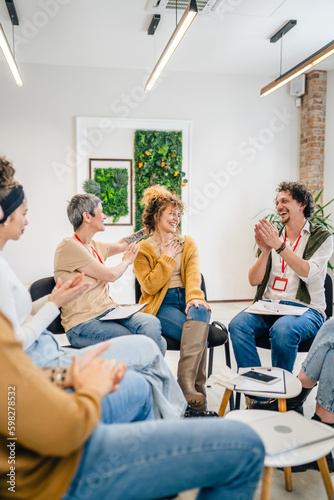 Support Group with Therapists and Woman in Focus solving problem
