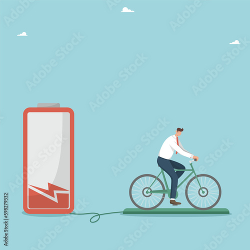 Renewable energy, green electricity, exercise bike generates electricity, healthy lifestyle, hard work to replenish energy and build strength for the future, a person on a bicycle charges the battery.