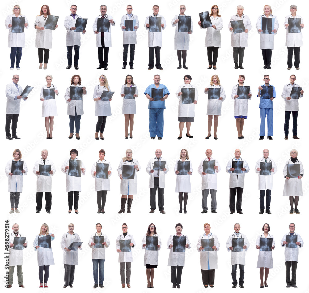 Obraz premium group of doctors holding x-ray isolated on white