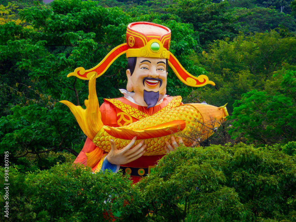 Foto de God of Fortune statue, Gardens by the Bay, Singapore do Stock Adobe Stock