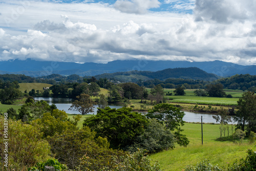 View of the Tweed Valley, from Tweed Regional Valley, with mountains of Lamington National Park and Springbrook Plateau on the horizon. Murwillumbah, New South Wales, Australia