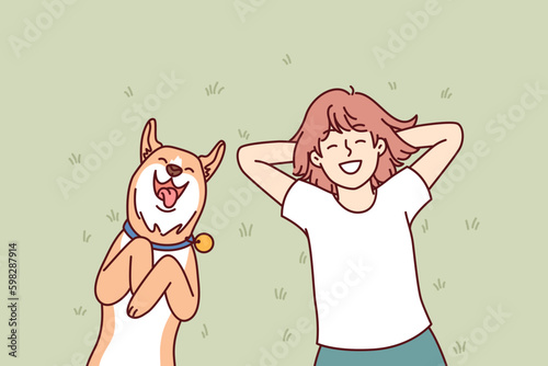 Little girl and dog lie on grass in backyard of house and enjoy sunny summer day. Laughing teenage girl with red dog shiba inu relaxing on lawn enjoying local pastime during vacation Generative AI