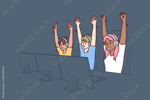 Team of teenagers esports or gamers have won multiplayer video game and are raising hands in triumph. Team of gamers are sitting at table with computers participating in cyber MMORPG Generative AI