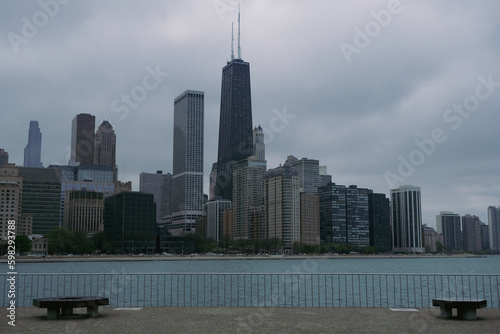 Skyline of Chicago, Illinois Windy City with skyscrapers and highrises in financial center downtown with Lake Michigan on dramatic clouds on stormy day