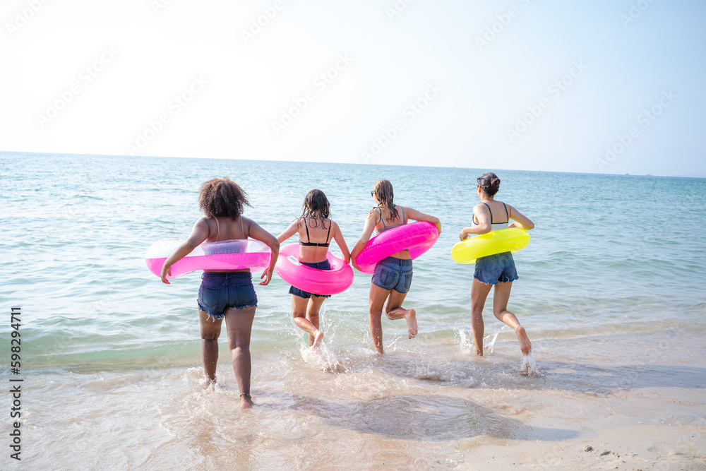 Happy female friends enjoy and fun outdoor activity lifestyle on holiday travel vacation at the sea,Friends fun together on the beach.