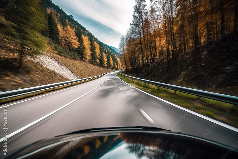 Fototapeta premium In mountainous environments with mountains; You can see a remote highway from the car driving