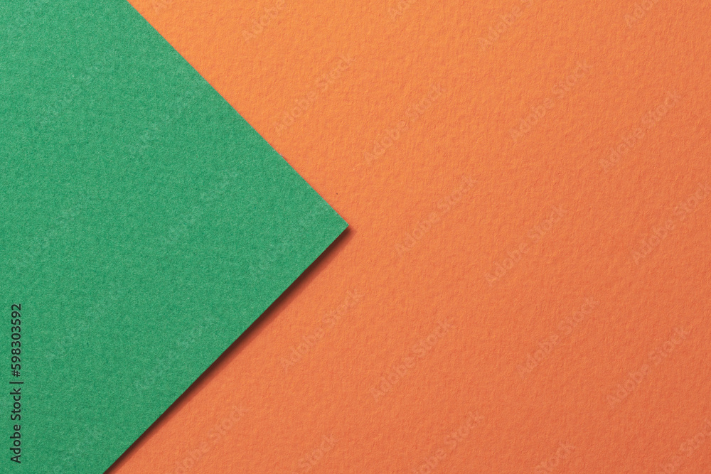 Fototapeta premium Rough kraft paper background, paper texture orange green colors. Mockup with copy space for text