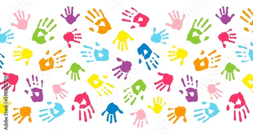 Multicolor different hand prints, background made from colorful handprints. Palms and fingers colored in rainbow colors. Multicolor pattern for your design.