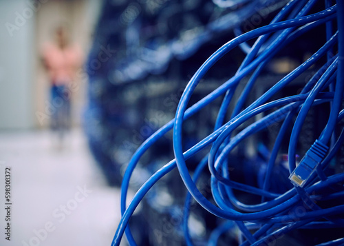Close-up of computer cables in server room photo