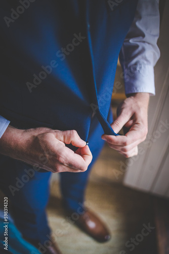 Close up creative image of a Groom s Wedding Attire at a real wedding