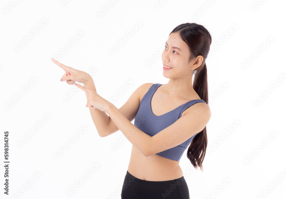 Portrait of beautiful young asian woman in sportwear smile and presenting isolated on white background, sport and exercise for health and weightloss, female and slimming showing something. Portrait of beautiful young asian woman in sportwear smile and presenting isolated on white background, sport and exercise for health and weightloss, female and slimming showing something.
