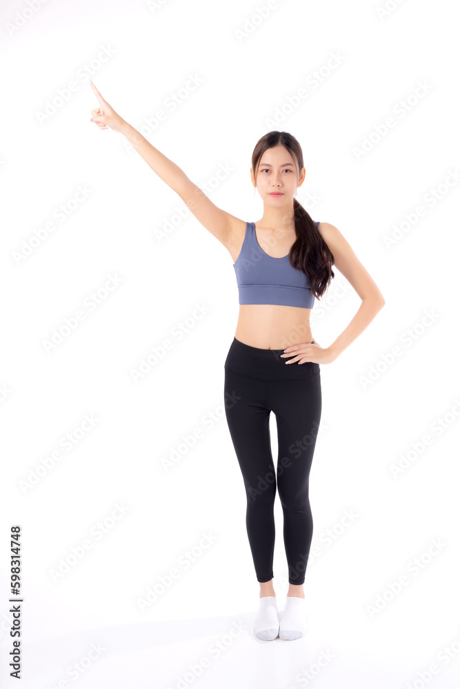 Portrait of beautiful young asian woman in sportwear smile and presenting isolated on white background, sport and exercise for health and weightloss, female and slimming showing something. Portrait of beautiful young asian woman in sportwear smile and presenting isolated on white background, sport and exercise for health and weightloss, female and slimming showing something.