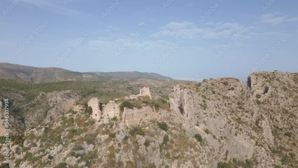 Mountain landscape and Garx castle in Tarbena Valley. Alicante Mountain landscape and Garx castle in Tarbena Valley. Alicante
