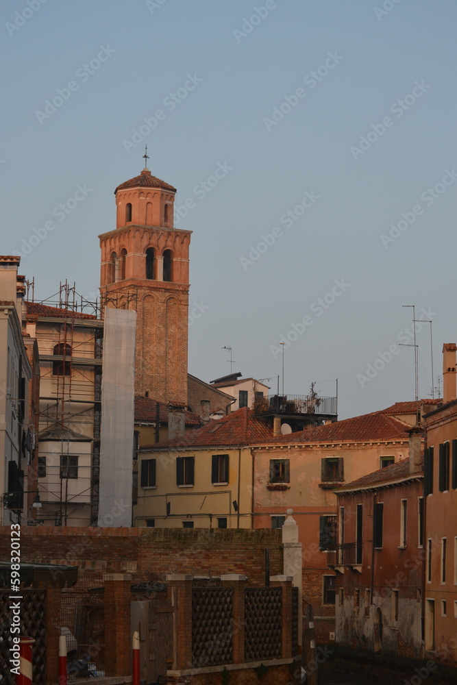 View of a Venice church with built houses typical of the series in Venice Italy