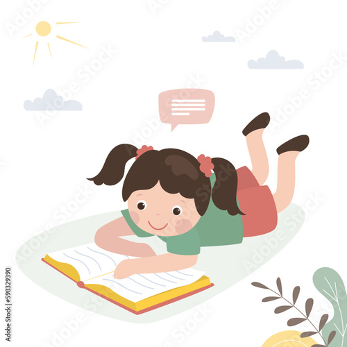 Cute little kid lies and read book. Happy kid in nature having fun time with storybook. Caucasian preschool girl reading and learning textbook. Education, pastime, entertainment.