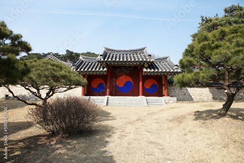Old Korean traditional house door with Taegeuk symbol