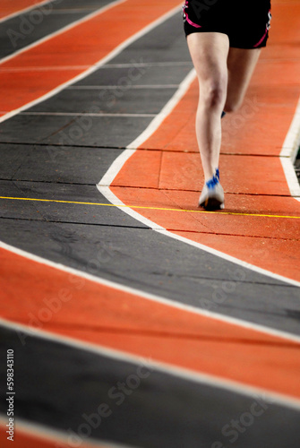Single Runner Running a Race on a Track Sports Competition