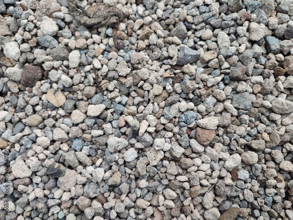 Gravel is small stones formed by the natural process of rock erosion. Gravel can be found in rivers, beaches, or even on roads as a hardening agent. Smooth and colorful pebbles. Gravel is small stones formed by the natural process of rock erosion. Gravel can be found in rivers, beaches, or even on roads as a hardening agent. Smooth and colorful pebbles.