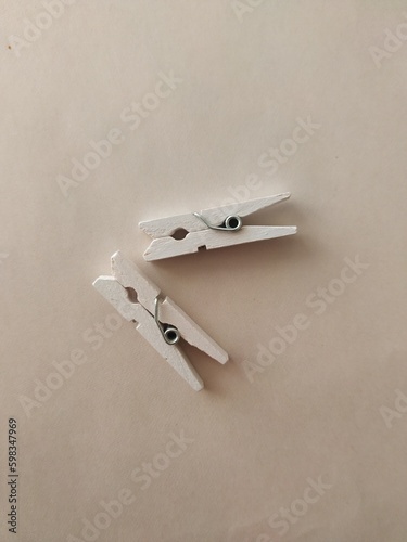 two white wooden clothespins, decorative clothespins for creativity
