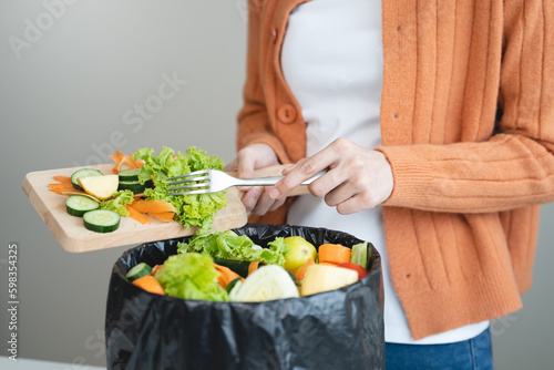 people put bio trash from food waste in domestic homes to compost bins to make fertilizer to reduce global environmental pollution.