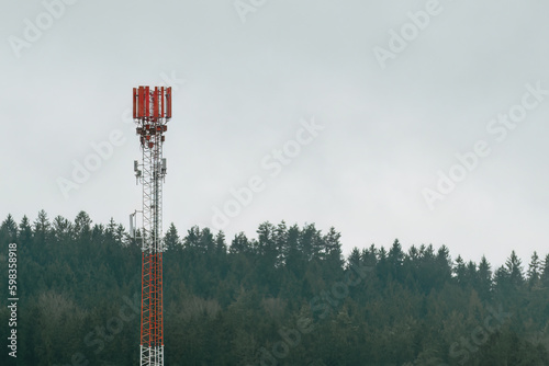 A cell phone LTE and 5g tower with a sky background