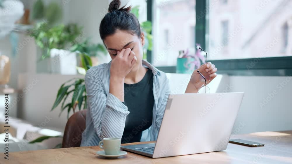 Video of stressed business woman working from home on laptop looking worried, tired and overwhelmed Video of stressed business woman working from home on laptop looking worried, tired and overwhelmed