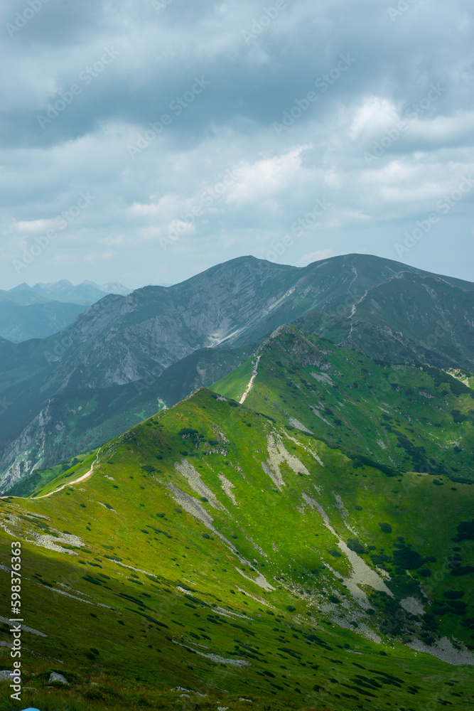 Fototapeta premium Beautiful view of the Tatra Mountains landscape. View of the mountains from the top. High mountain landscape.