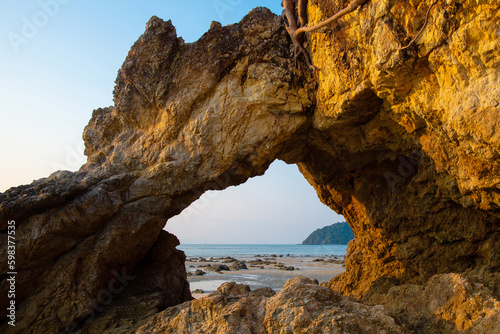 Beautiful natural rock formation on the beach in the summer.