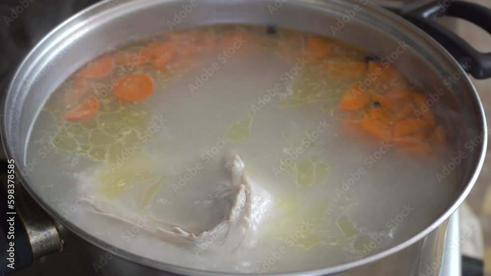 chicken broth is cooked,chicken broth is cooked on the stove chicken broth is cooked,chicken broth is cooked on the stove