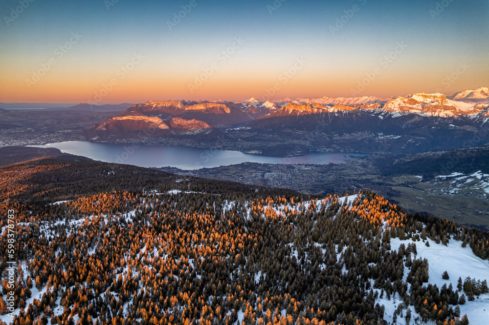 View of lake Annecy (France) and the alps from the Semnoz, a family ski resort, south of Annecy. Mont-Blanc (4808 m) can be seen. - obrazy, fototapety, plakaty 