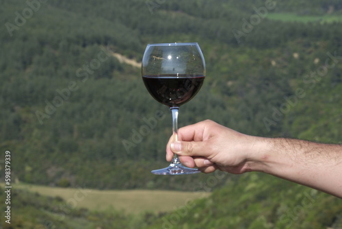 glass of wine in hand