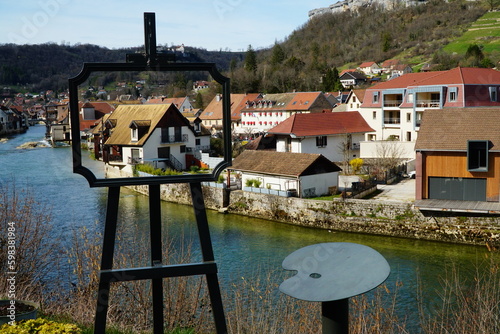 View on the Ornans river and buildings with the house inscribed in the easel