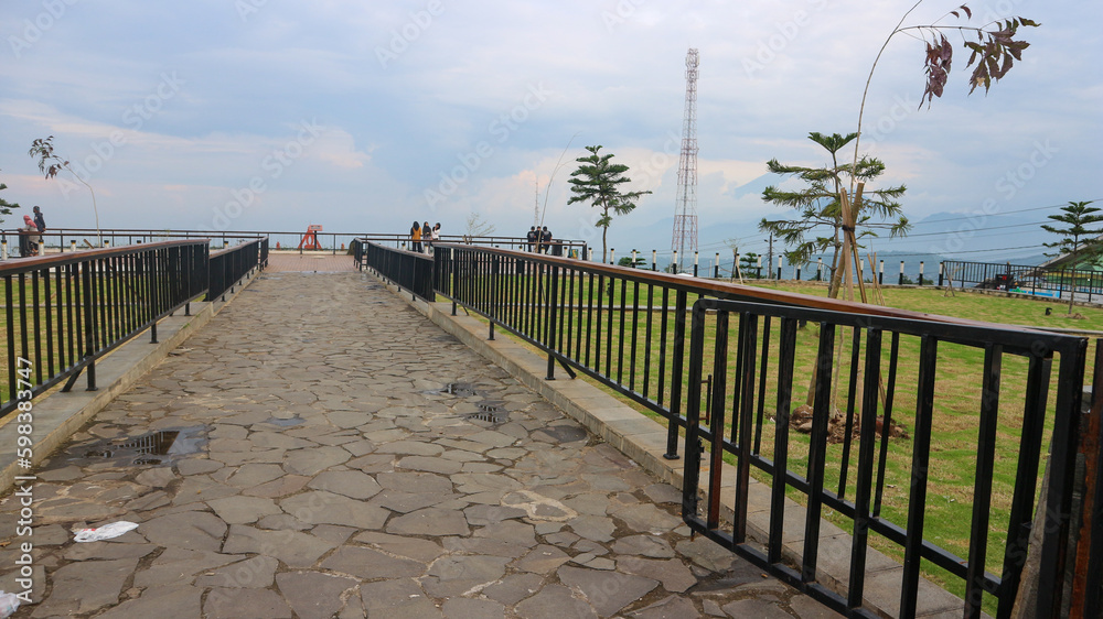 Semarang, 5 December 2022 - Park in Bandungan square. Many people relax during the afternoon.