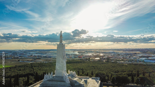 Aerial drone photo of the Cristo del Sagrado Corazon de Jesus del Cerro de los Ángeles in Getafe, Madrid, during a sunny day