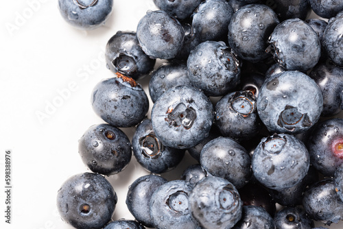 Blueberry fruit in close-up. Ripe fruit  blueberry berries isolated. Background with fruits.
