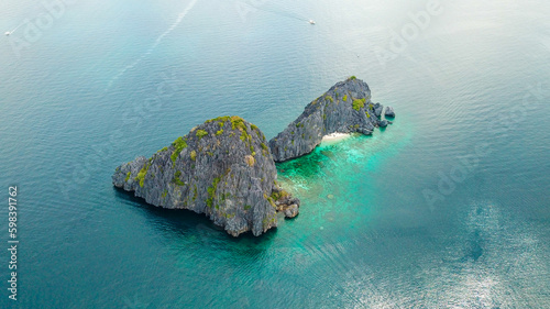 Aerial photos with drone of Nido in the Philippines, overlooking the islands and the sea, during a sunny day