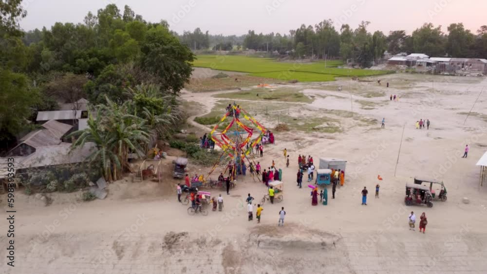 Nagordola, or the local version of the ferris wheel, at the fair of Balashighat, Gaibandha in Bangladesh Nagordola, or the local version of the ferris wheel, at the fair of Balashighat, Gaibandha in Bangladesh