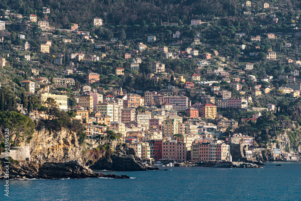 View of Camogli, a small town near Genoa, and surrounding hills. Liguria, Italy
