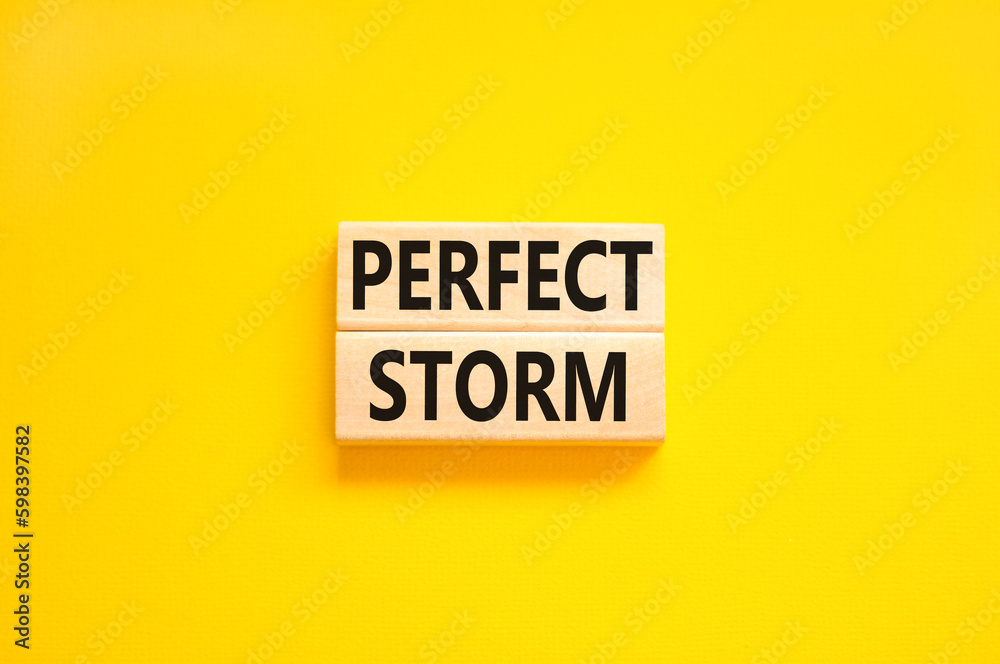 Perfect storm symbol. Concept words Perfect storm on beautiful wooden block. Beautiful yellow table yellow background. Business and Perfect storm concept. Copy space. Perfect storm symbol. Concept words Perfect storm on beautiful wooden block. Beautiful yellow table yellow background. Business and Perfect storm concept. Copy space.