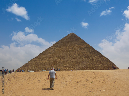 Egyptian pyramids in sand desert and clear sky © Nacor